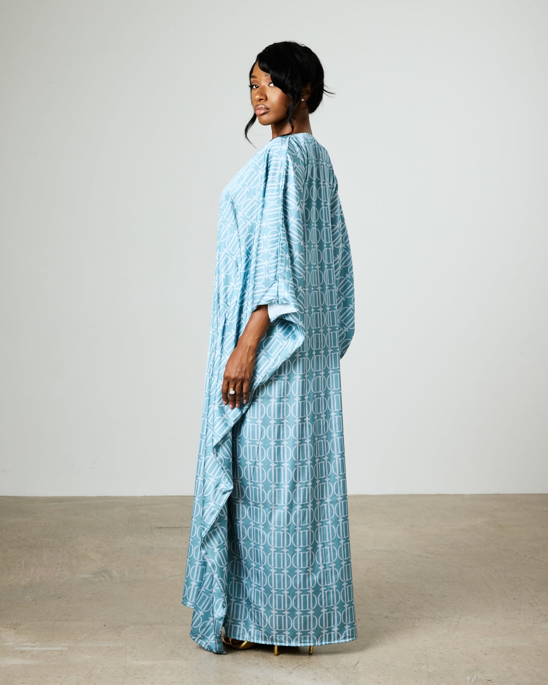 The Zaire Boubou — three-quarter view, Blue Mist Monogram